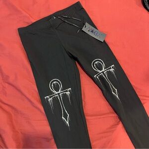 Dolls Kill Black Leggings with White Ankh Graphics